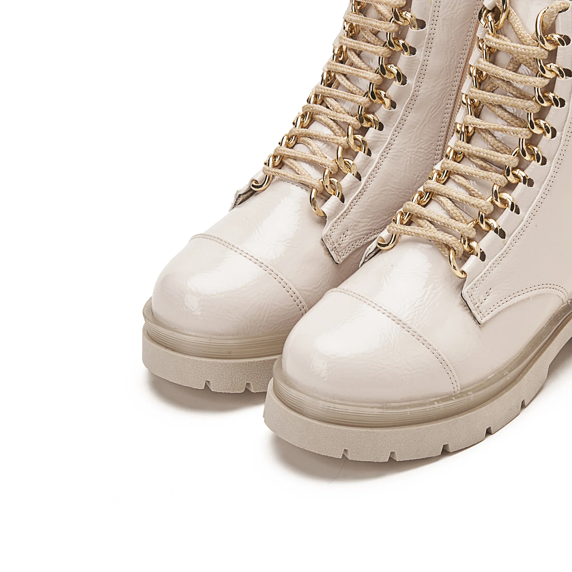 Women Shiny Chunky Lace Up Boots With Golden Accessory - Beige